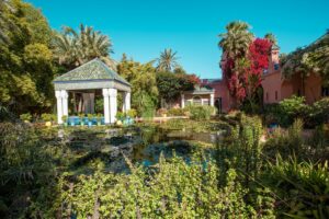 Pavilion, pond and bougainvillea in a Marrakech garden