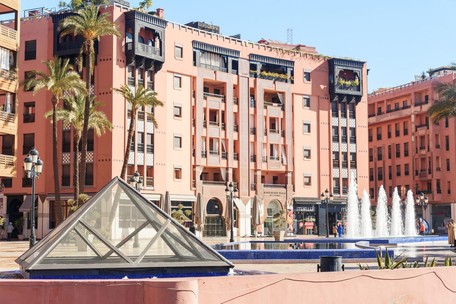 Striking façades and shaded cafés in the Guéliz district of Marrakech