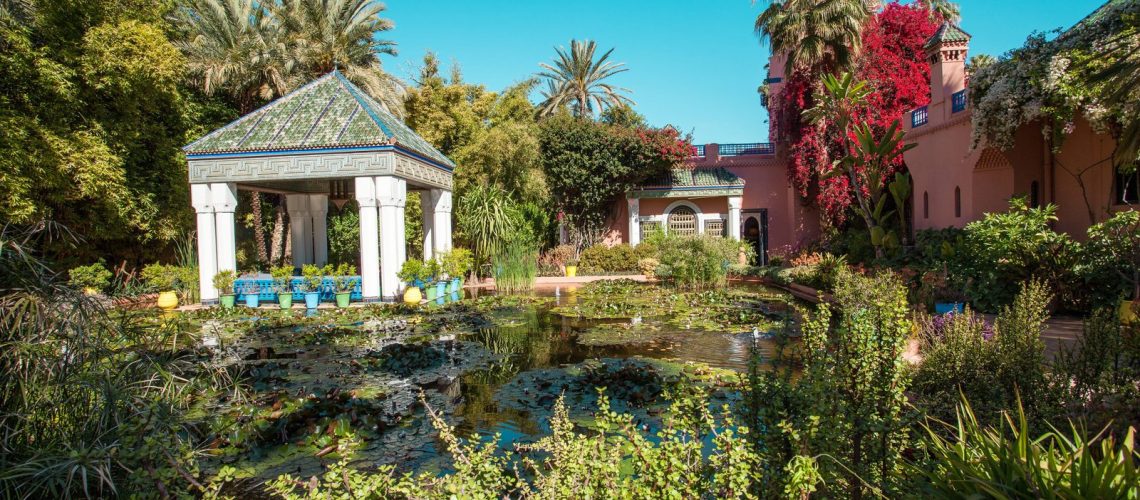 Pavilion, pond and bougainvillea in a Marrakech garden